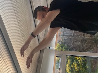 Photo of Martin demonstrating mindful movements.